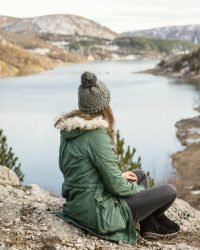 back-view-young-beautiful-woman-nature